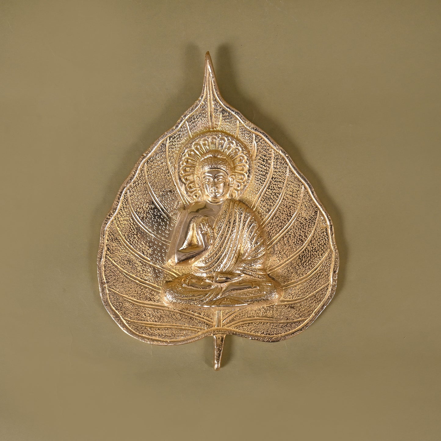 Brass Buddha on Leaf Wall Hanging
